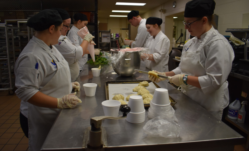 Group of student chefs prepping